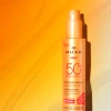 Nuxe Sun Mleczko do opalania twarzy i ciała SPF50, 150 ml